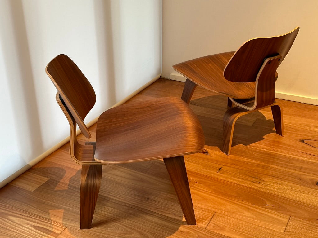 - Set of Two Herman Miller Eames LCW Walnut Lounge Chairs