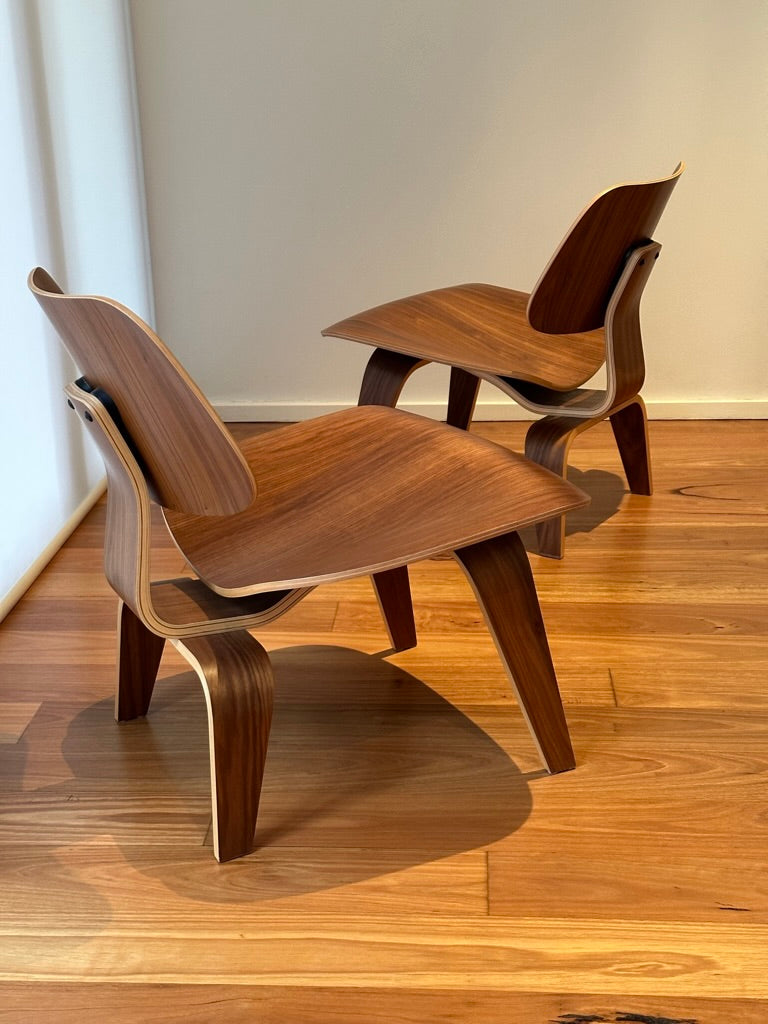 - Set of Two Herman Miller Eames LCW Walnut Lounge Chairs