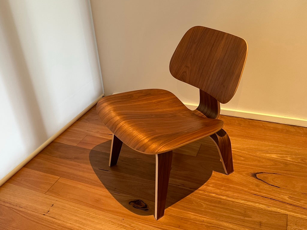 - Set of Two Herman Miller Eames LCW Walnut Lounge Chairs