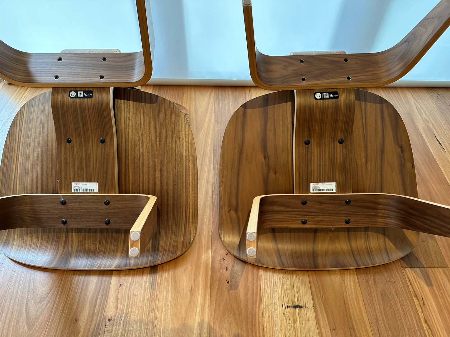 - Set of Two Herman Miller Eames LCW Walnut Lounge Chairs