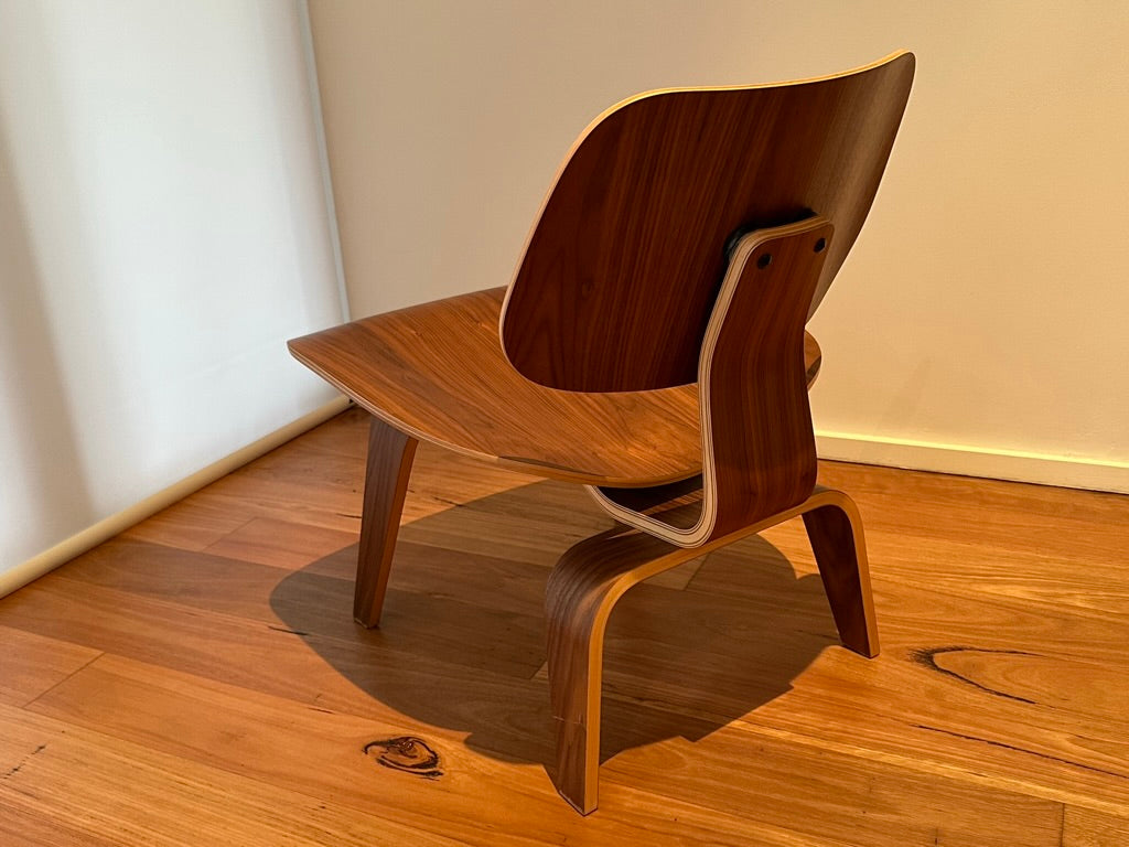 - Set of Two Herman Miller Eames LCW Walnut Lounge Chairs