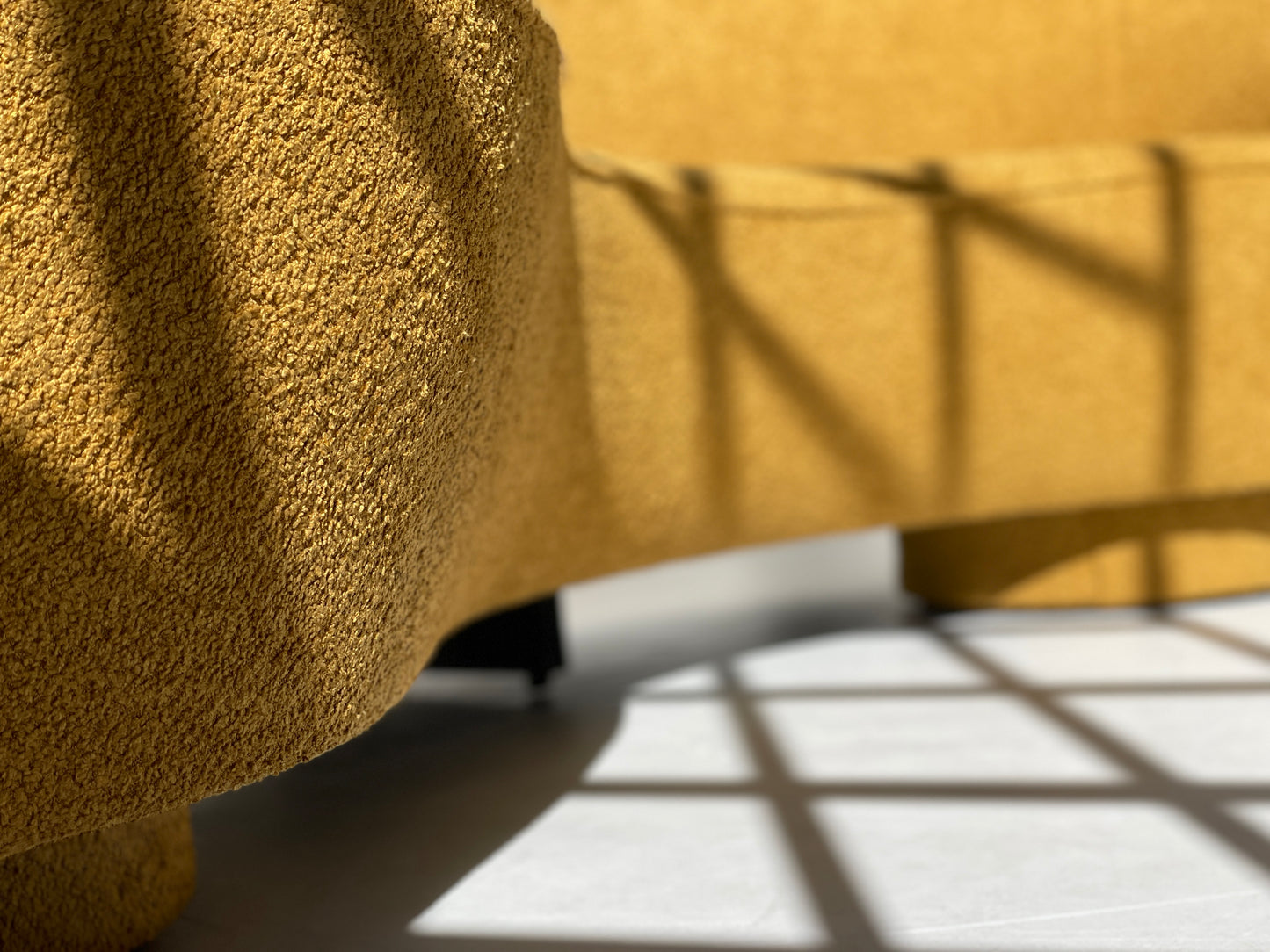 - Curved Mustard Bouclé Sofa