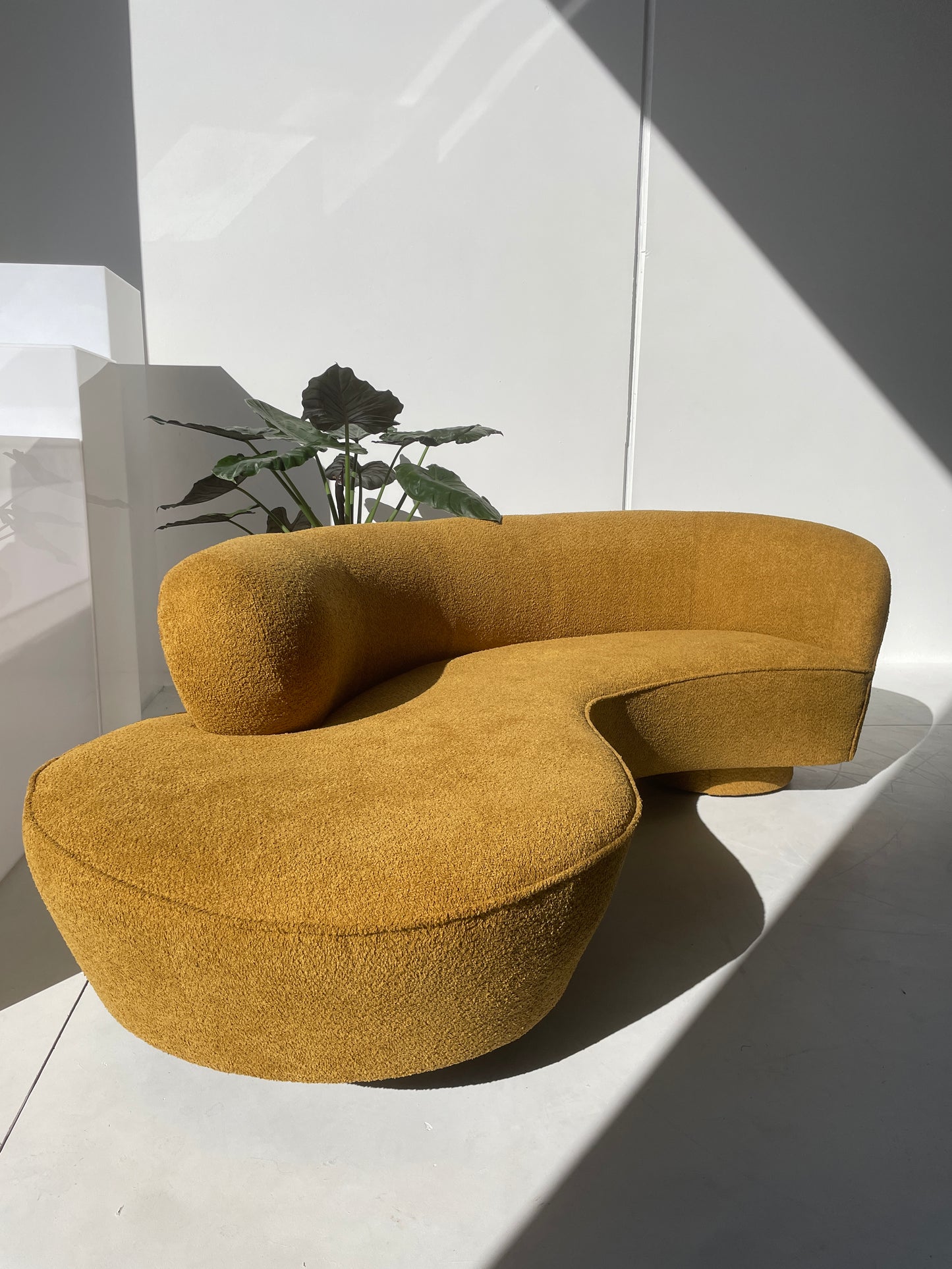 - Curved Mustard Bouclé Sofa