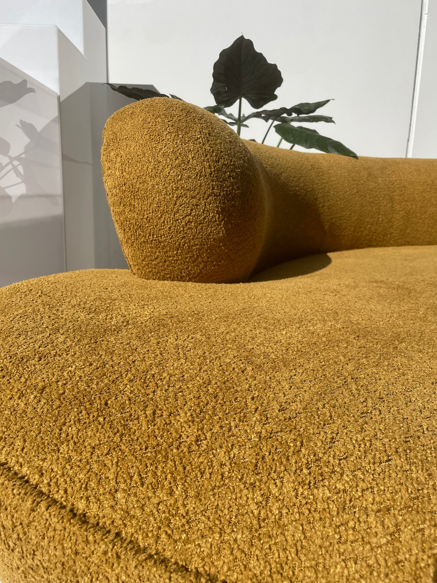 - Curved Mustard Bouclé Sofa