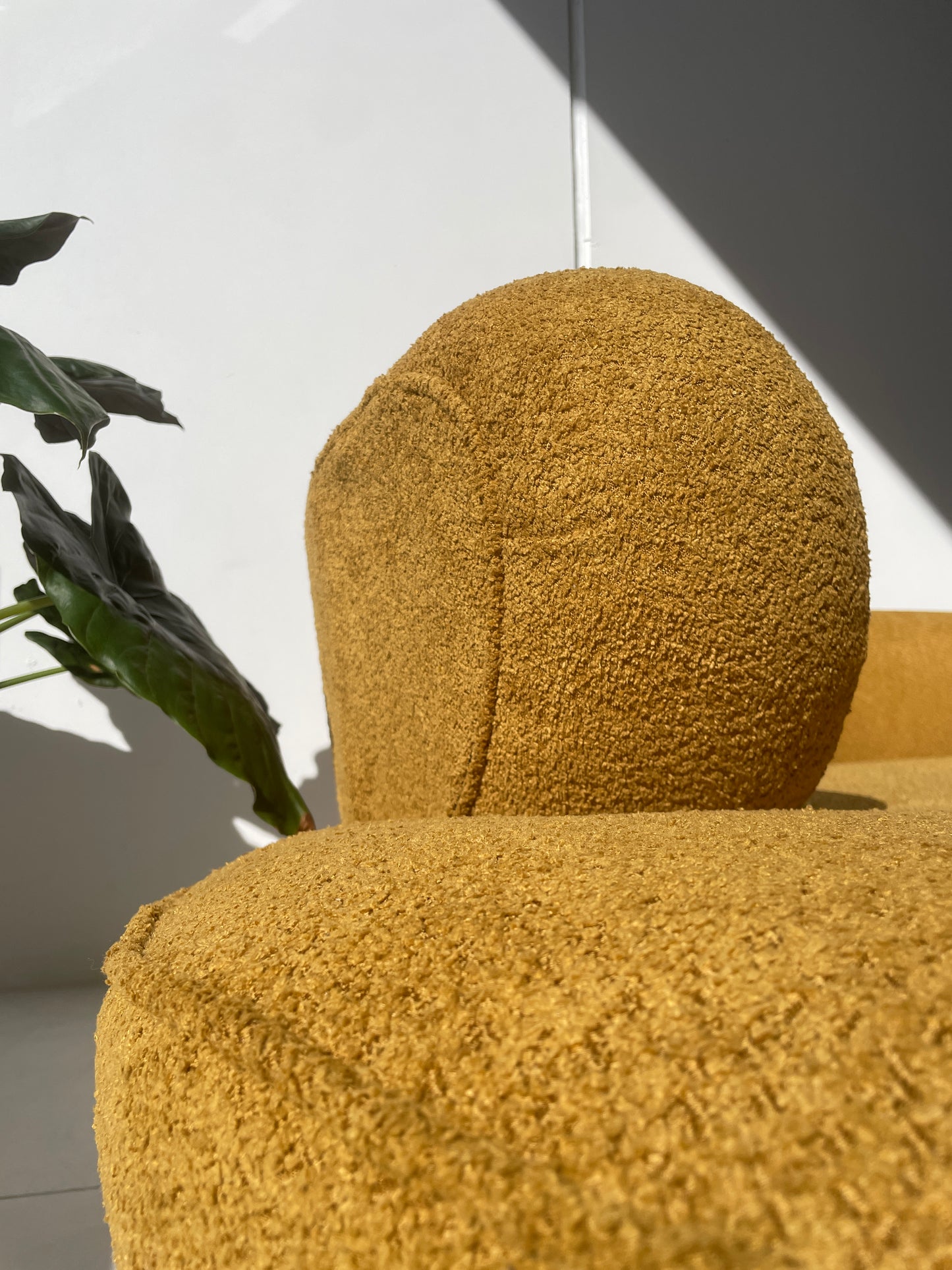 - Curved Mustard Bouclé Sofa