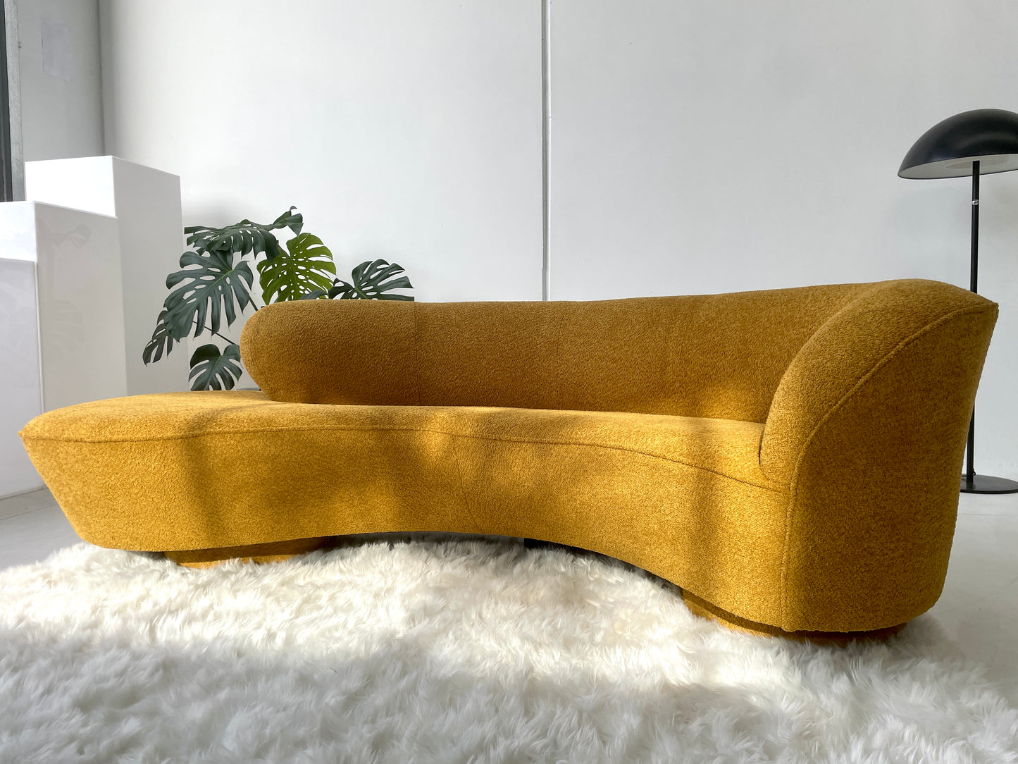 - Curved Mustard Bouclé Sofa