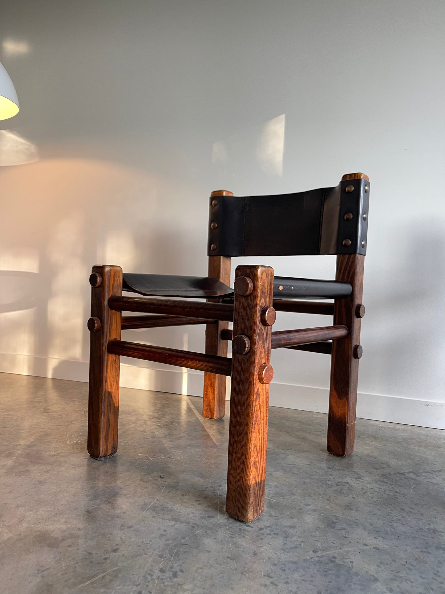 - Pair of Norman Archibald Nore Leather Dining Chairs