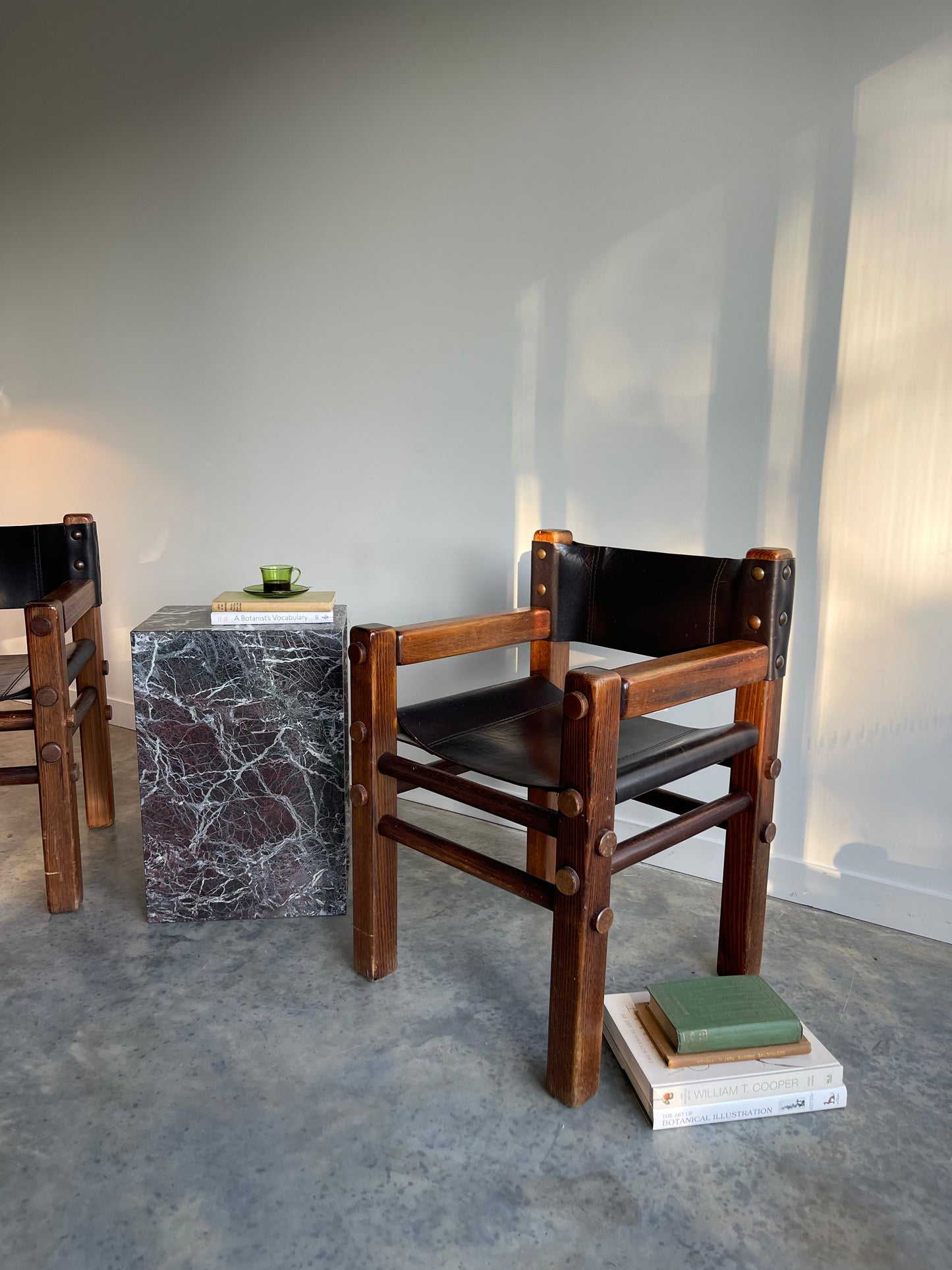 - Pair of Norman Archibald Nore Leather Dining Chairs
