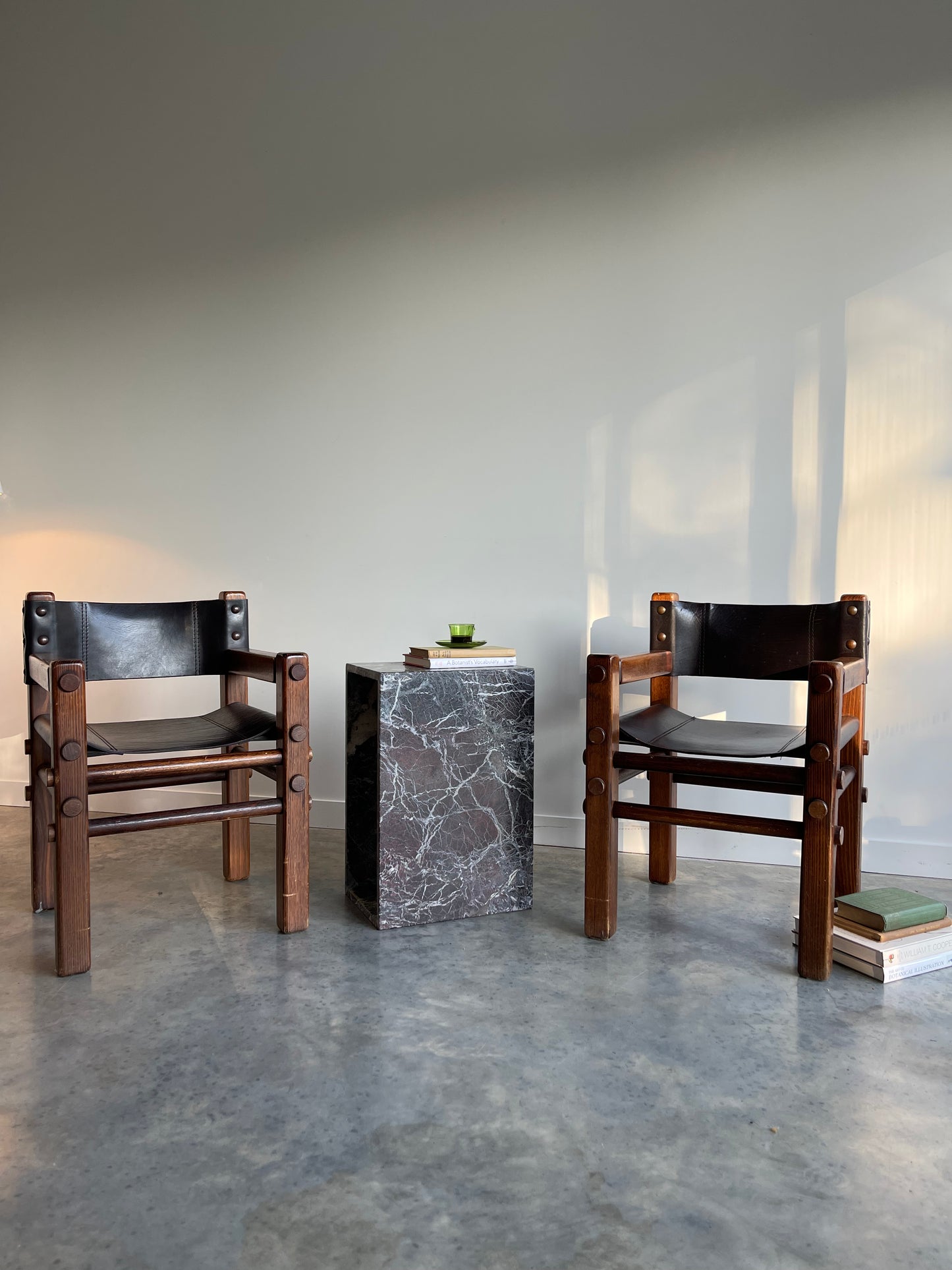 - Pair of Norman Archibald Nore Leather Dining Chairs