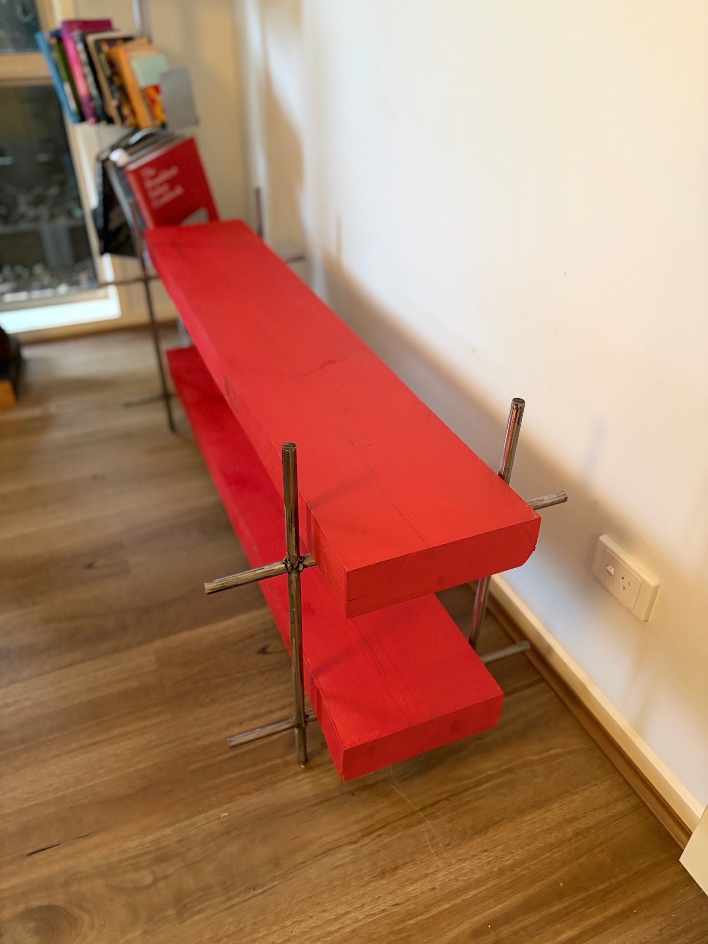 Polished Steel and Red Timber Table