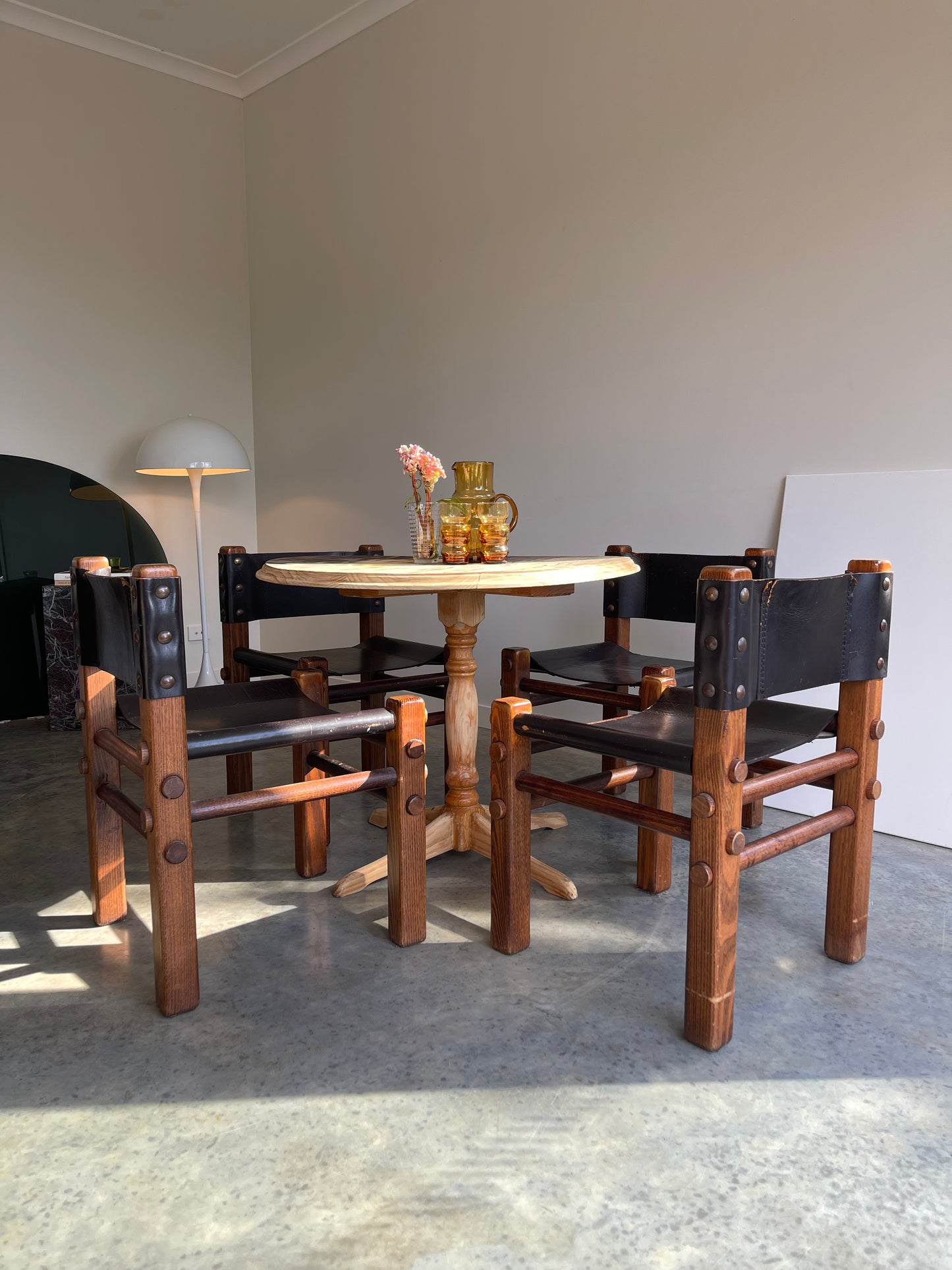 - Pair of Norman Archibald Nore Leather Dining Chairs