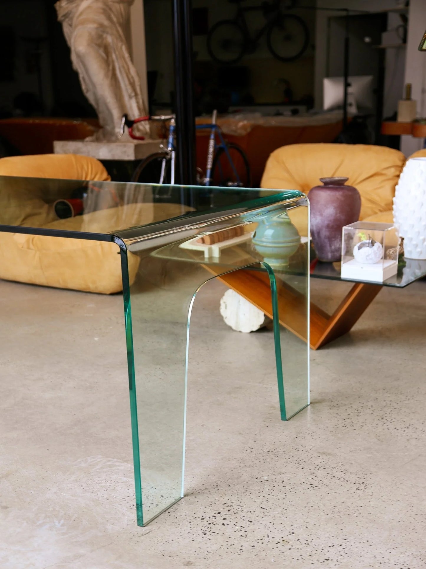 FIAM Italy Curved Glass Waterfall Table