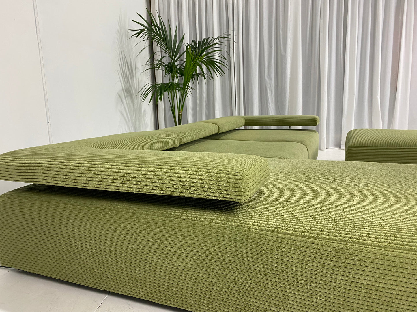 - Green Jumbo Corduroy Four Piece Modular Sofa