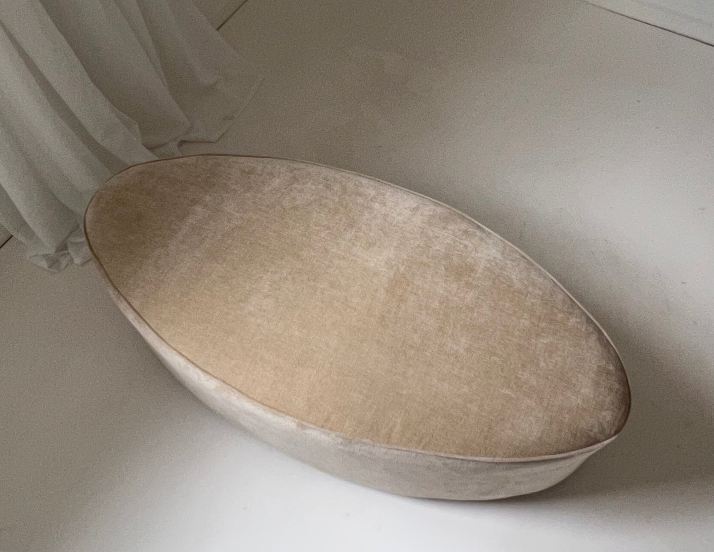 - Curved Ottoman in Cashew Velvet