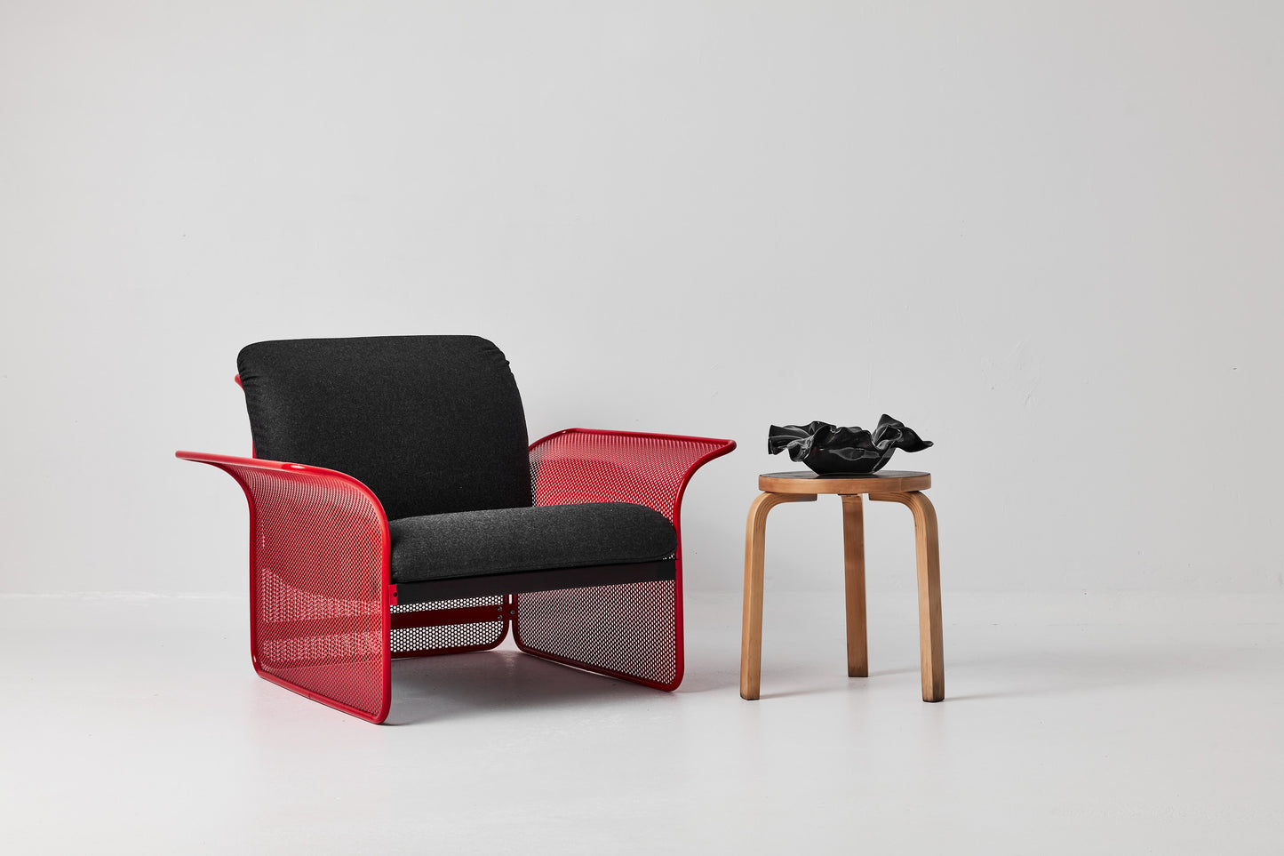 Restored Red perforated steel lounge chair - One available