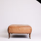 Leather Ottoman with Turned Legs & Castors