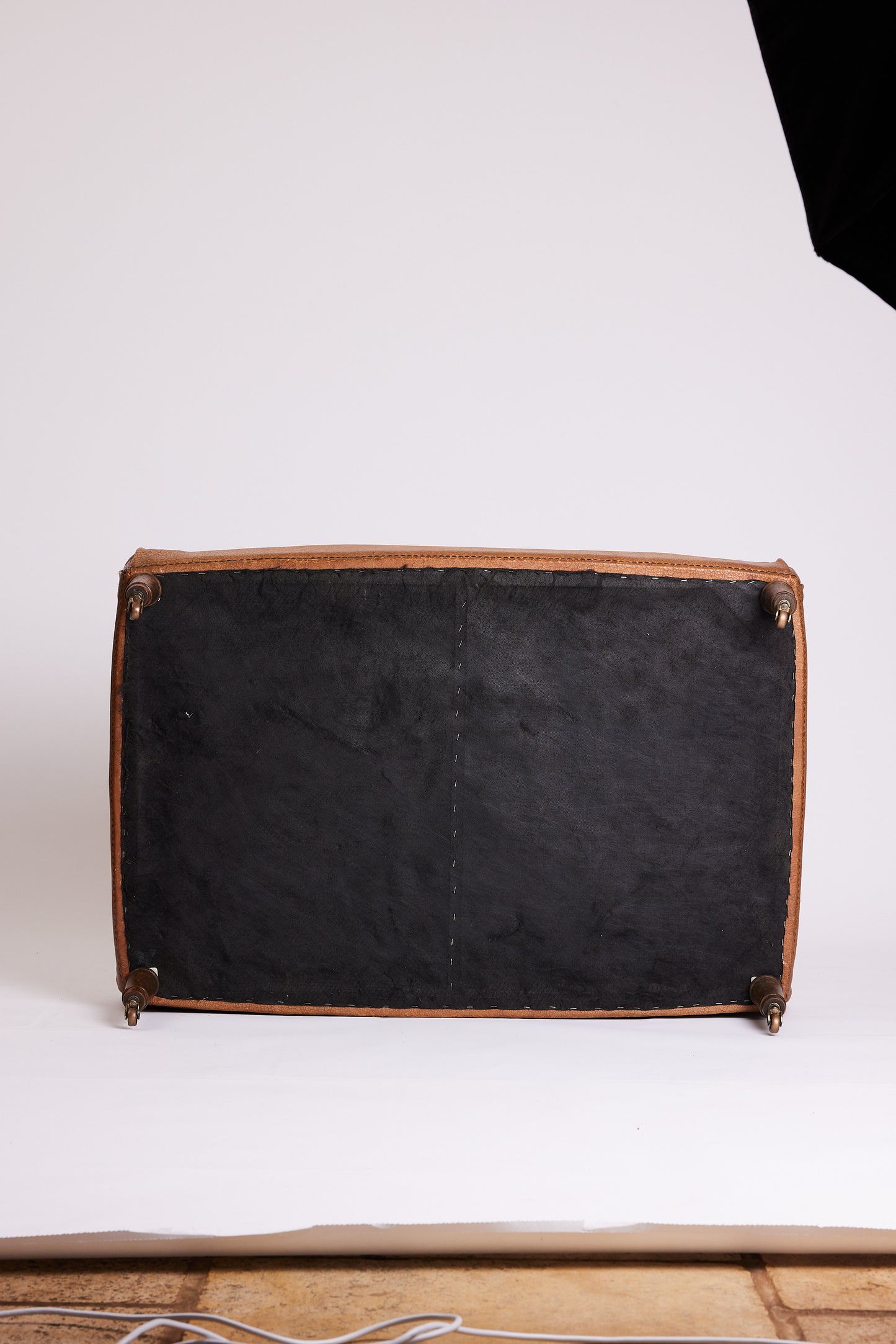 Leather Ottoman with Turned Legs & Castors