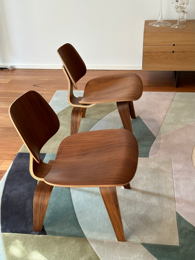 - Set of Two Herman Miller Eames LCW Walnut Lounge Chairs