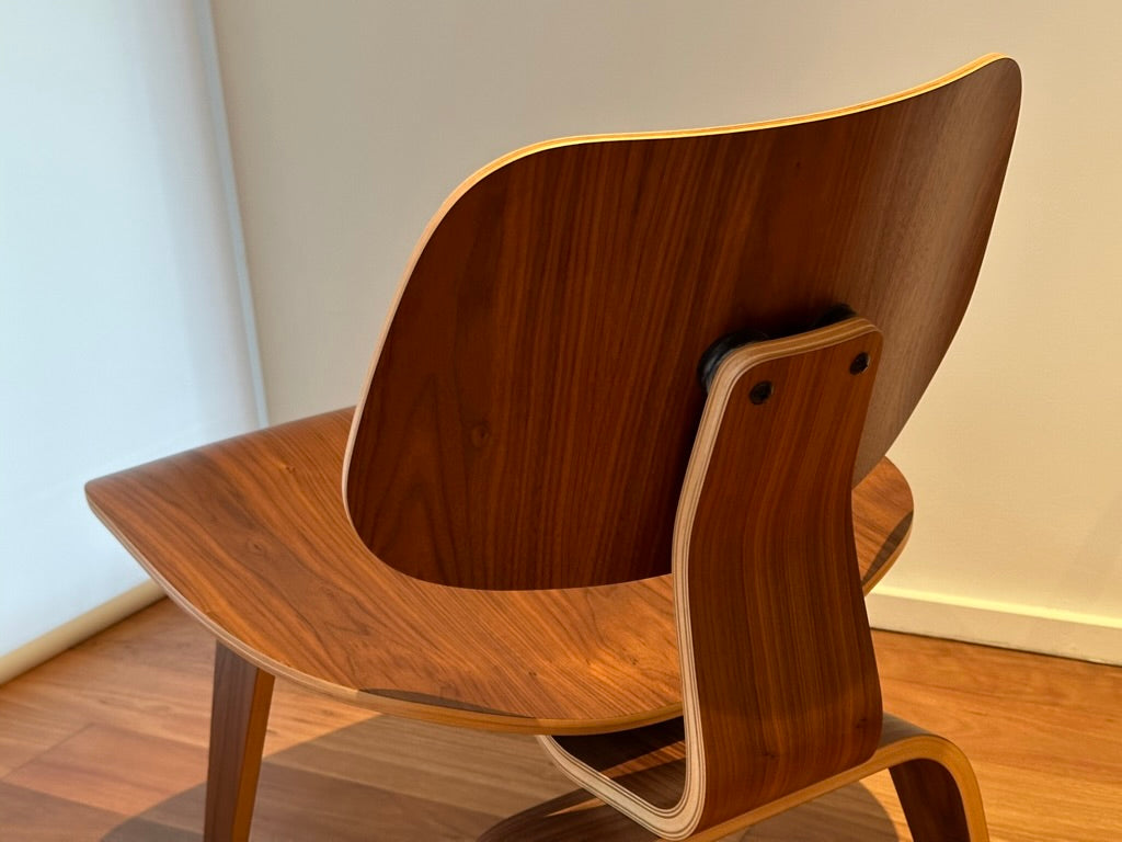 - Set of Two Herman Miller Eames LCW Walnut Lounge Chairs