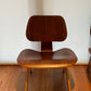 - Set of Two Herman Miller Eames LCW Walnut Lounge Chairs