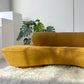 - Curved Mustard Bouclé Sofa