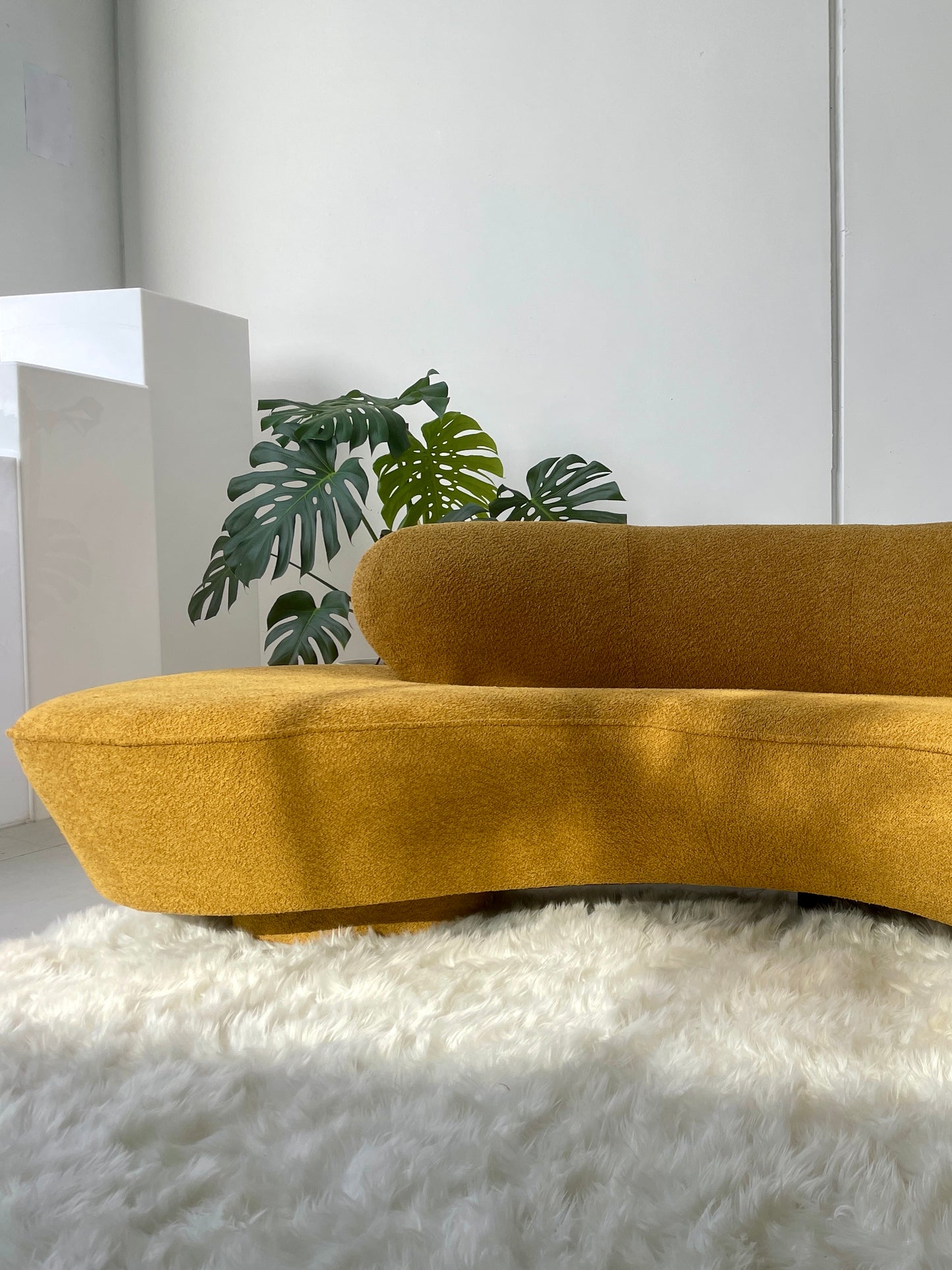 - Curved Mustard Bouclé Sofa