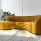 - Curved Mustard Bouclé Sofa