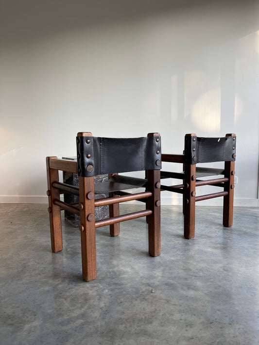 - Pair of Norman Archibald Nore Leather Dining Chairs