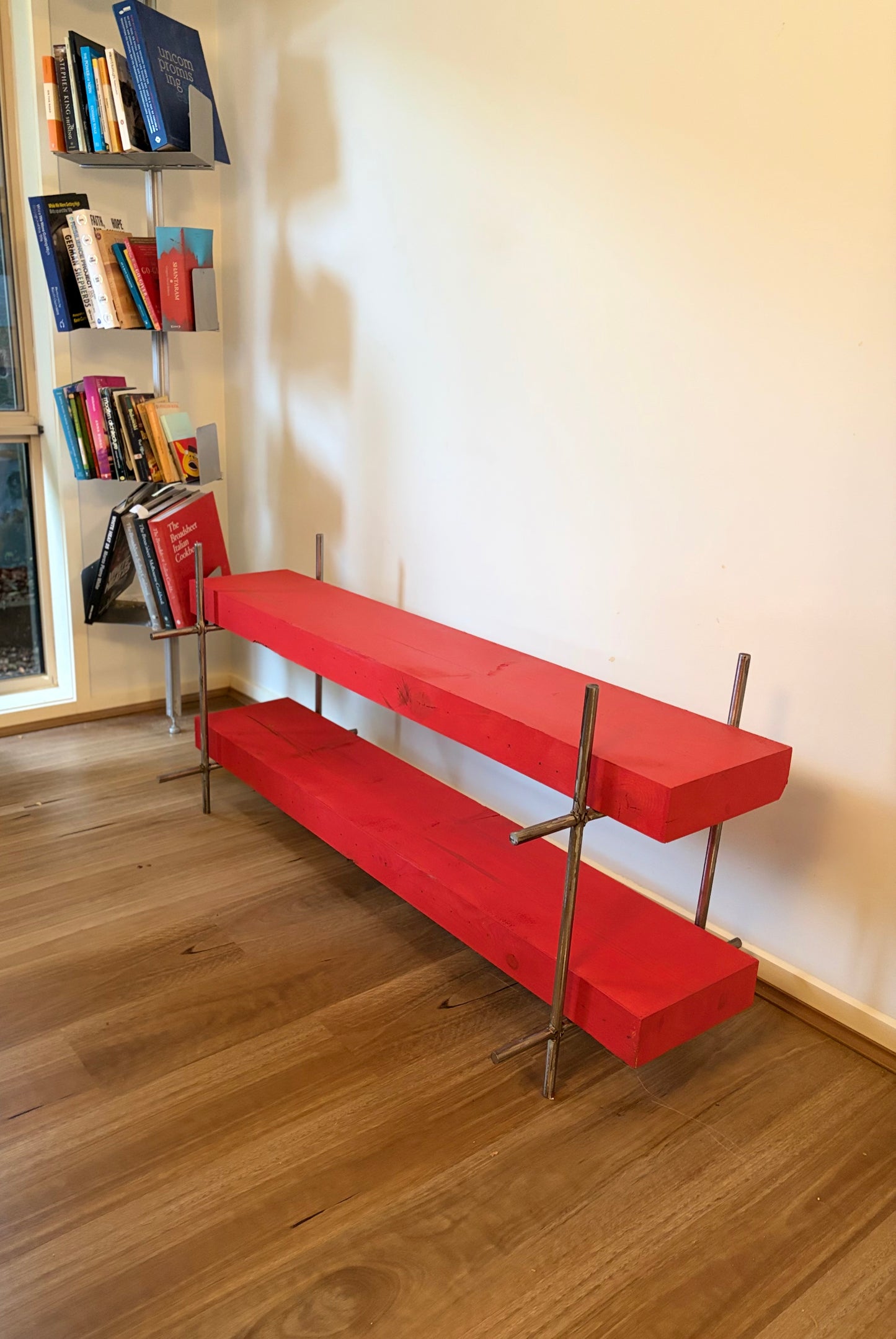 Polished Steel and Red Timber Table