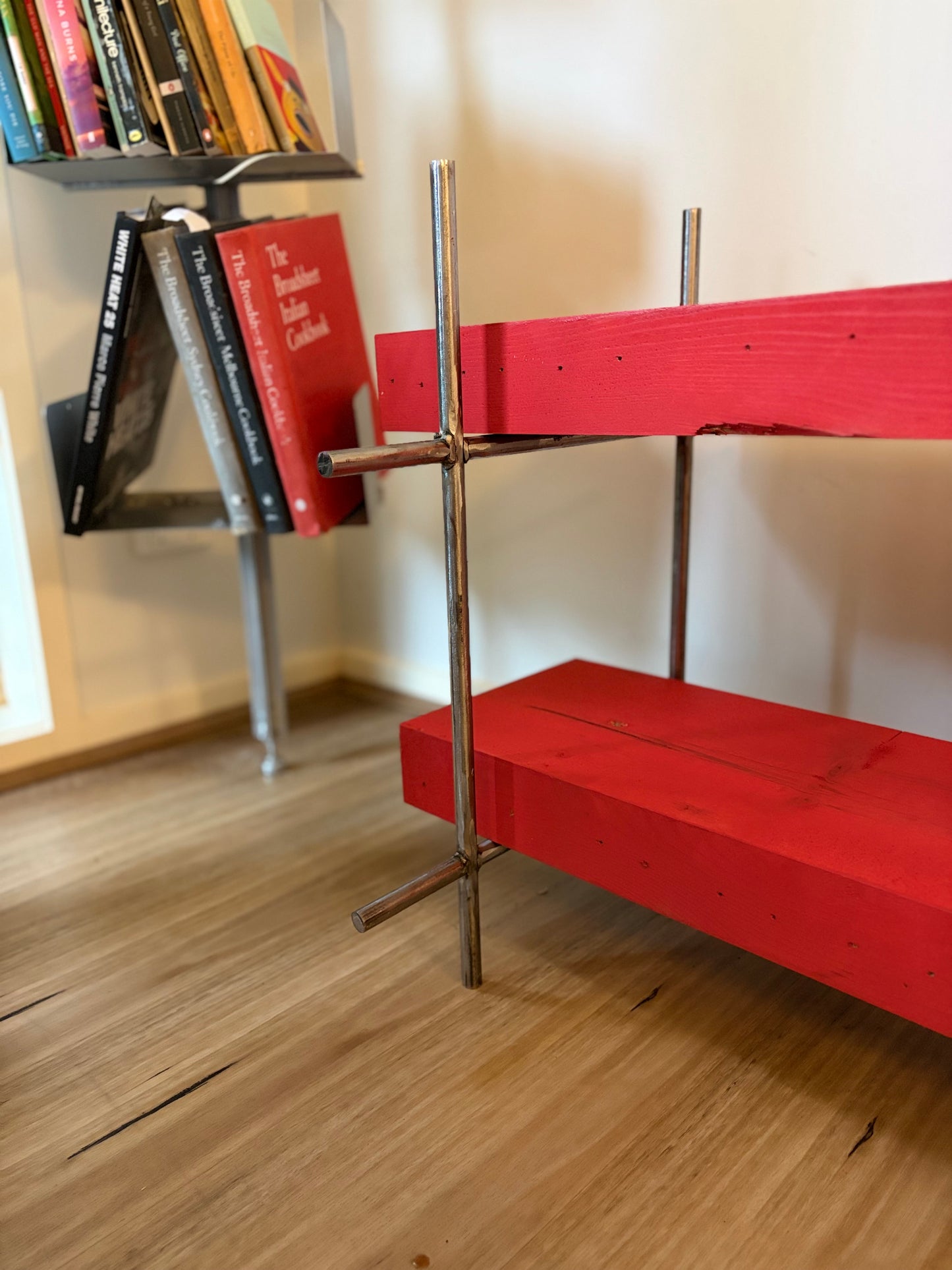 Polished Steel and Red Timber Table