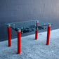 Postmodern Glass Dining Table with Red Lacquered Legs Italy