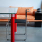 Postmodern Glass Dining Table with Red Lacquered Legs Italy