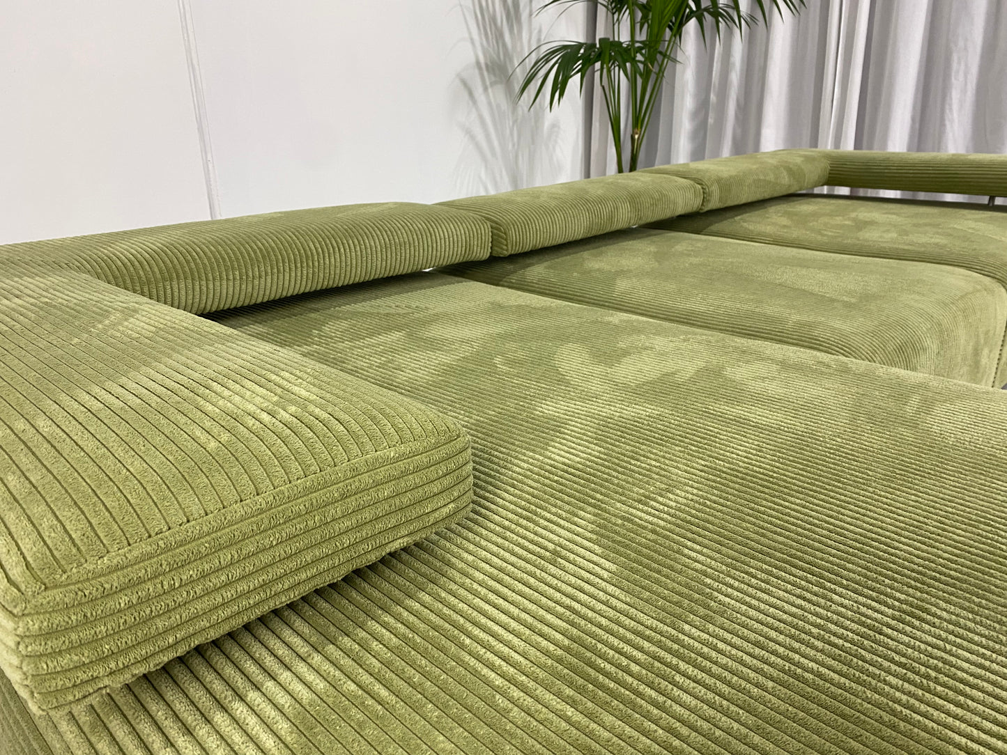 - Green Jumbo Corduroy Four Piece Modular Sofa
