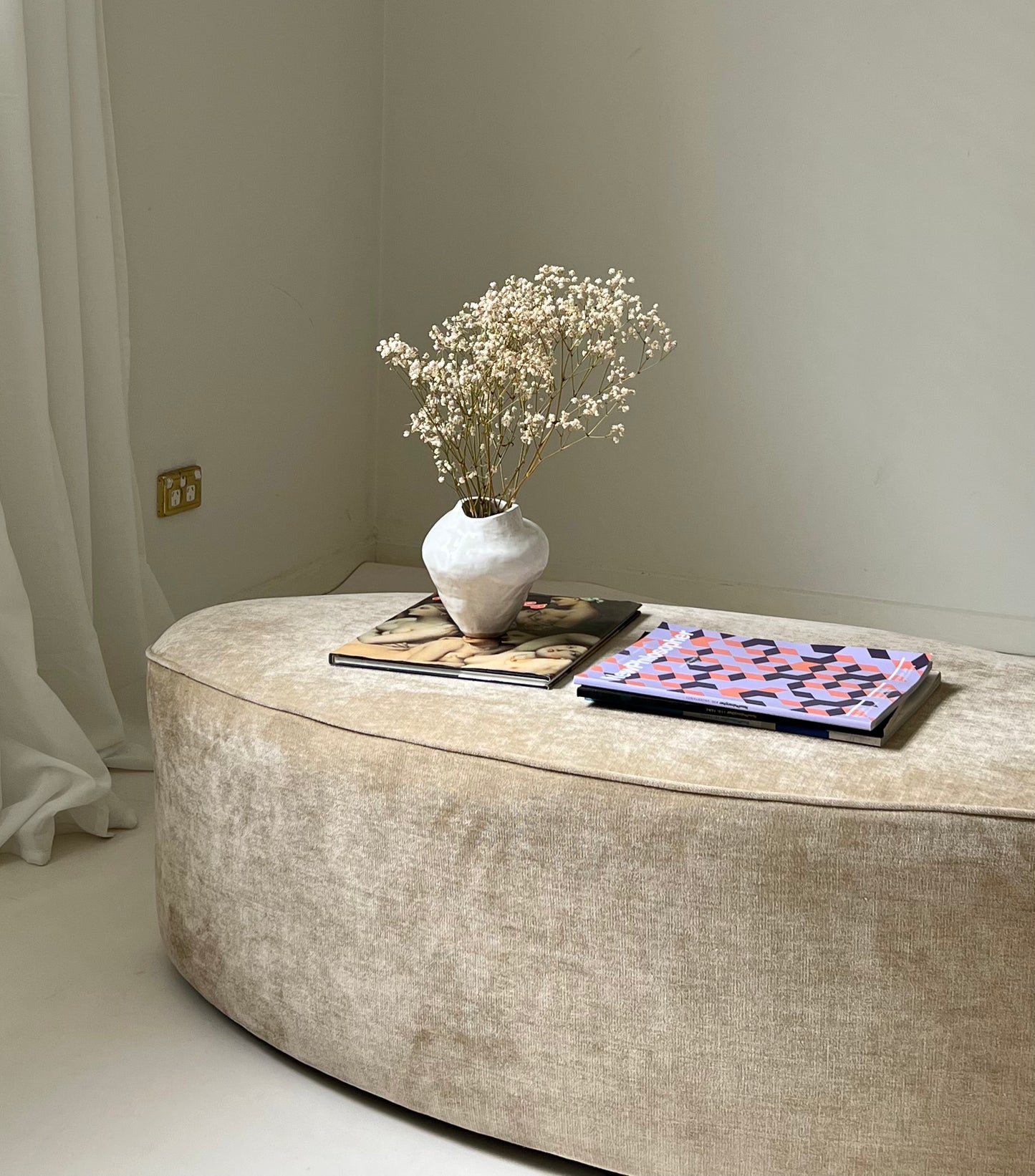 - Curved Ottoman in Cashew Velvet