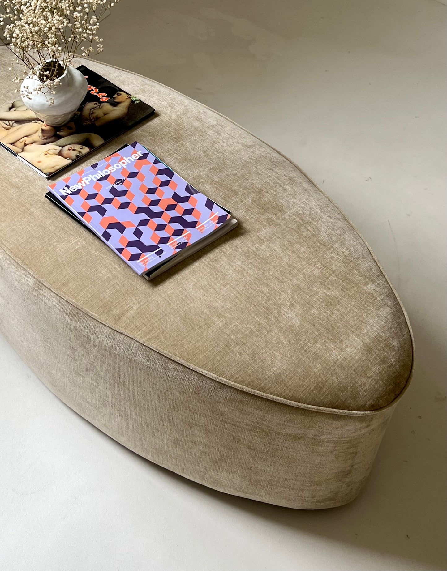 - Curved Ottoman in Cashew Velvet