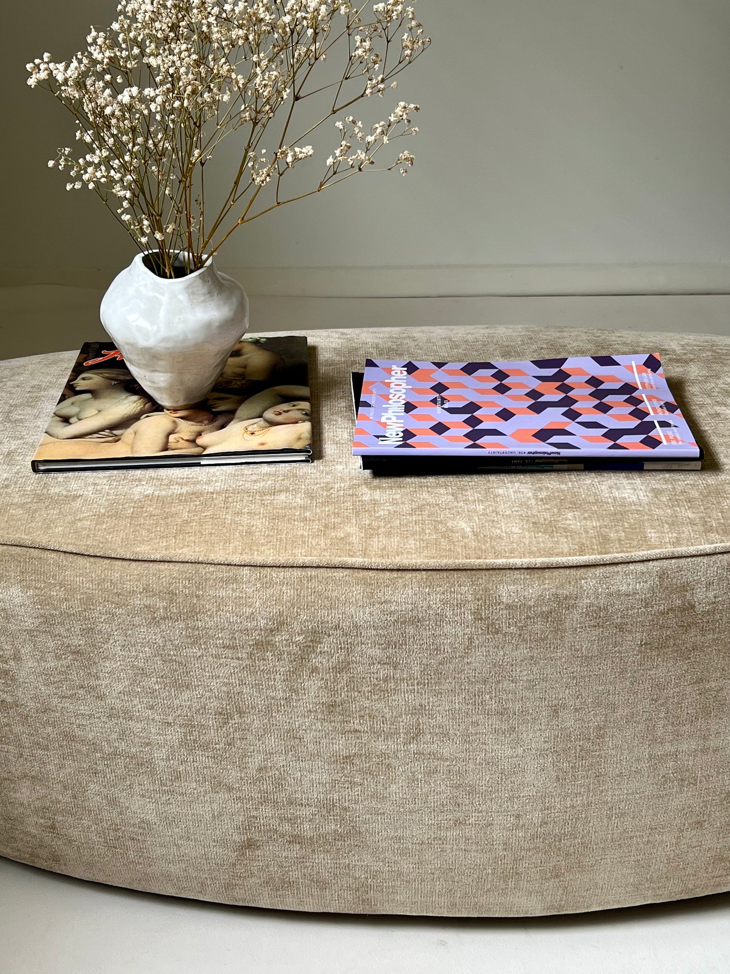 - Curved Ottoman in Cashew Velvet