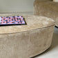 - Curved Ottoman in Cashew Velvet