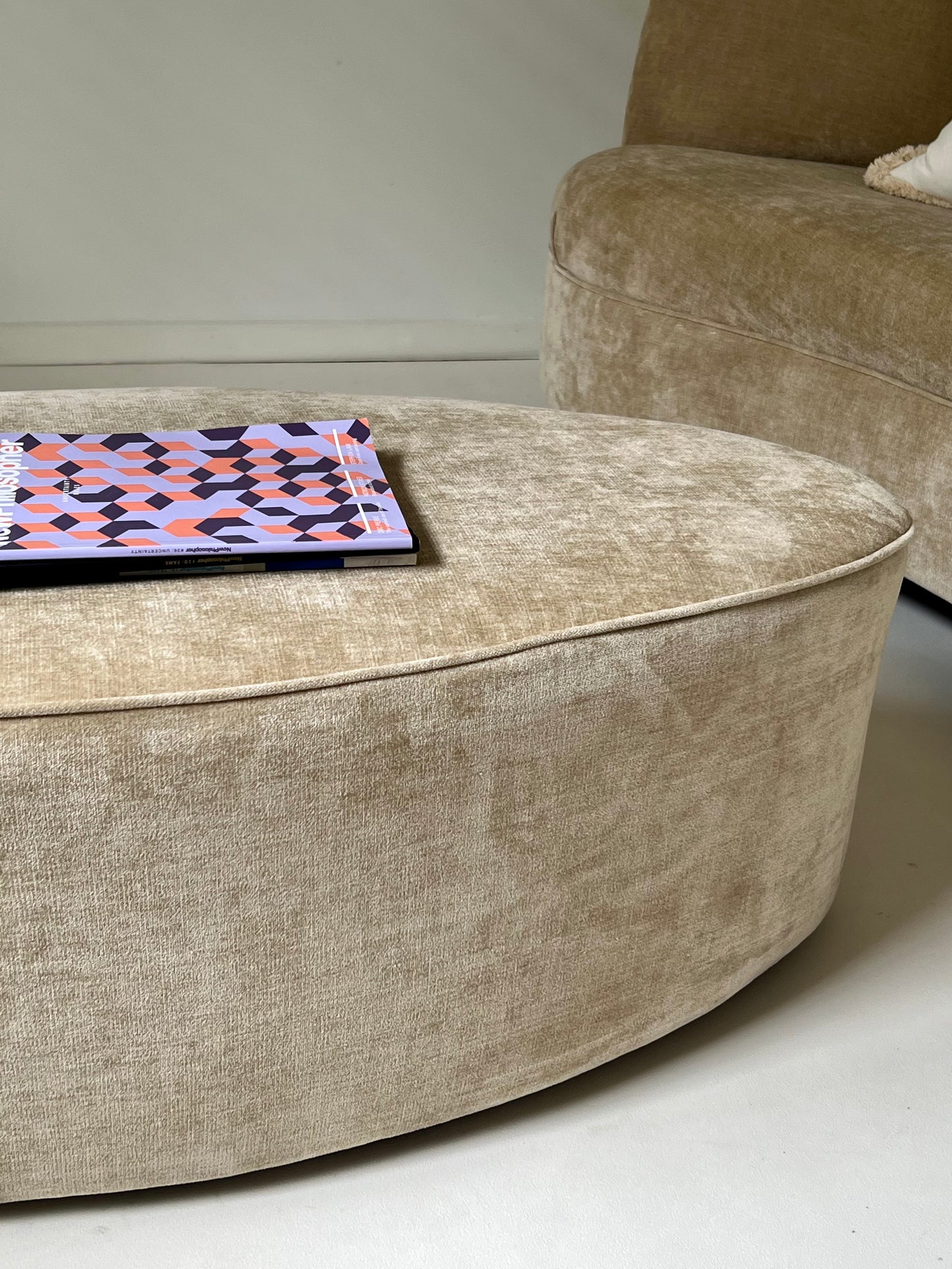 - Curved Ottoman in Cashew Velvet