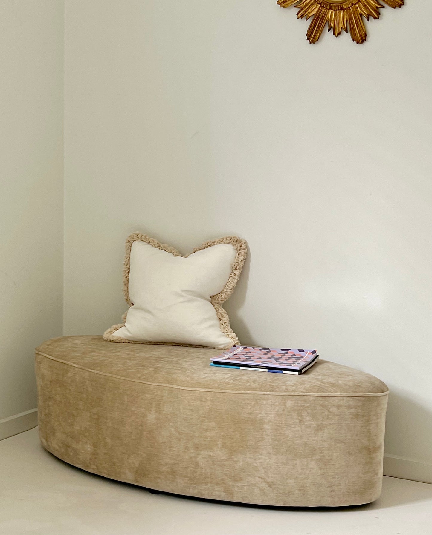 - Curved Ottoman in Cashew Velvet