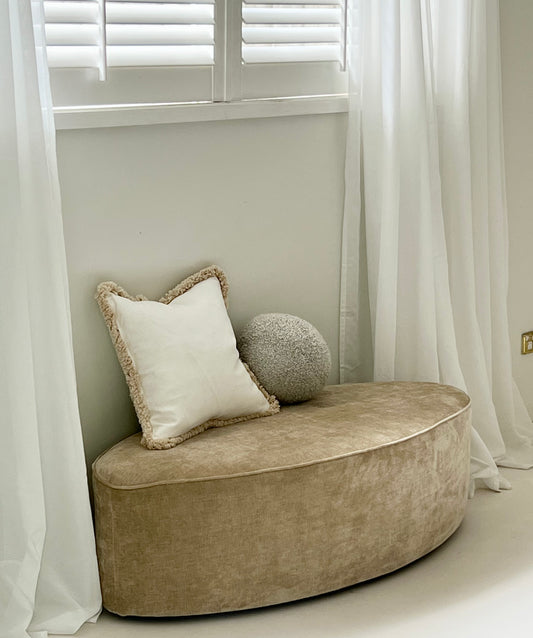 - Curved Ottoman in Cashew Velvet