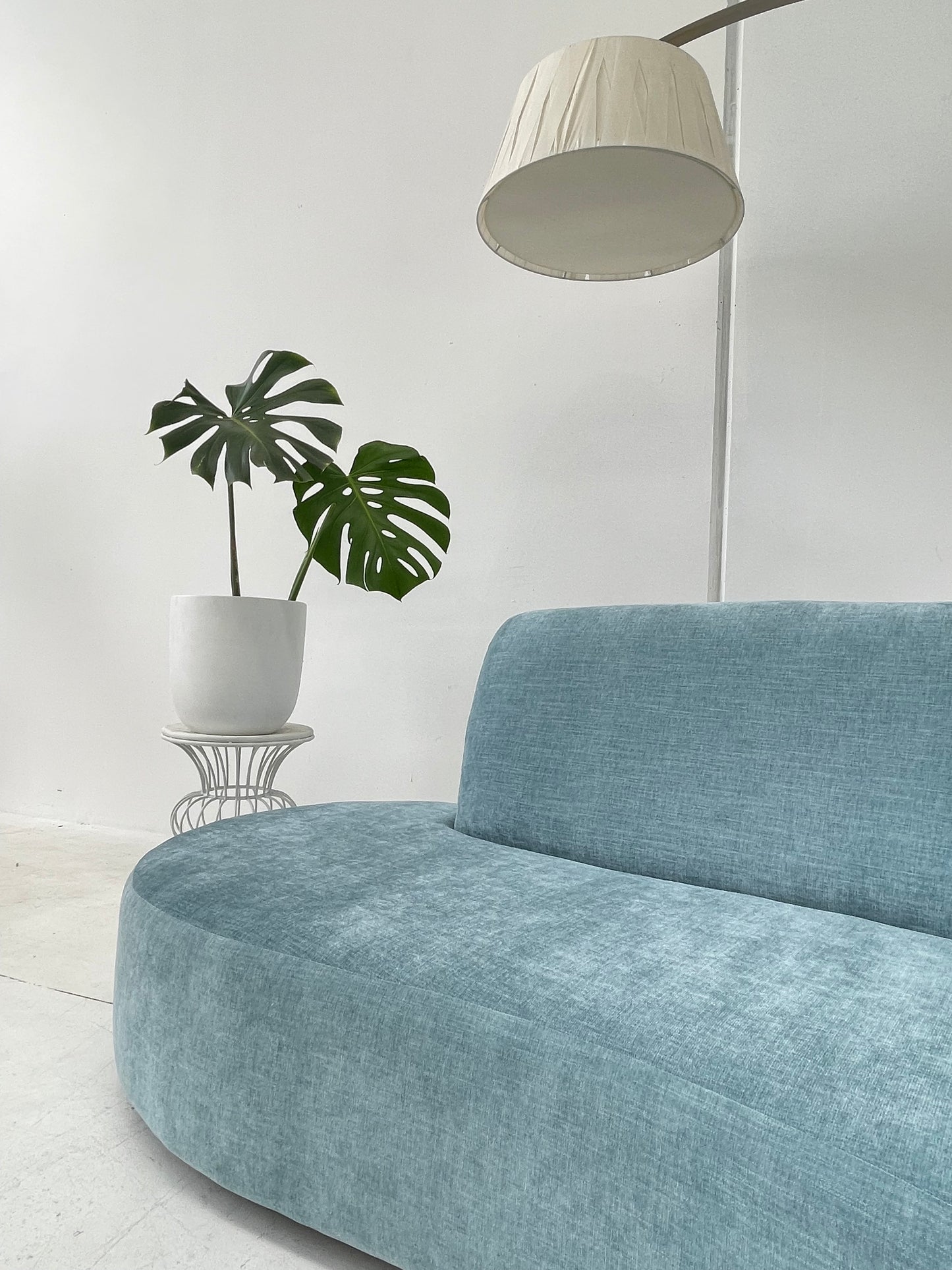 - Vintage Sky Blue Curved Sofa