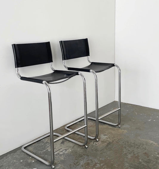 - Pair of Black Leather and Chrome Cantilever Bar Stools