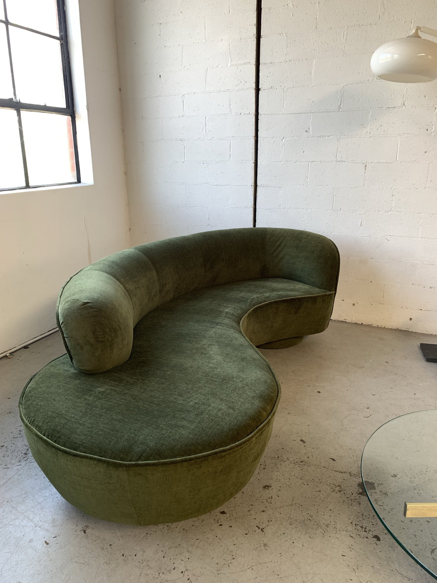 Curved Velvet Sofa in Deep Botanical Green