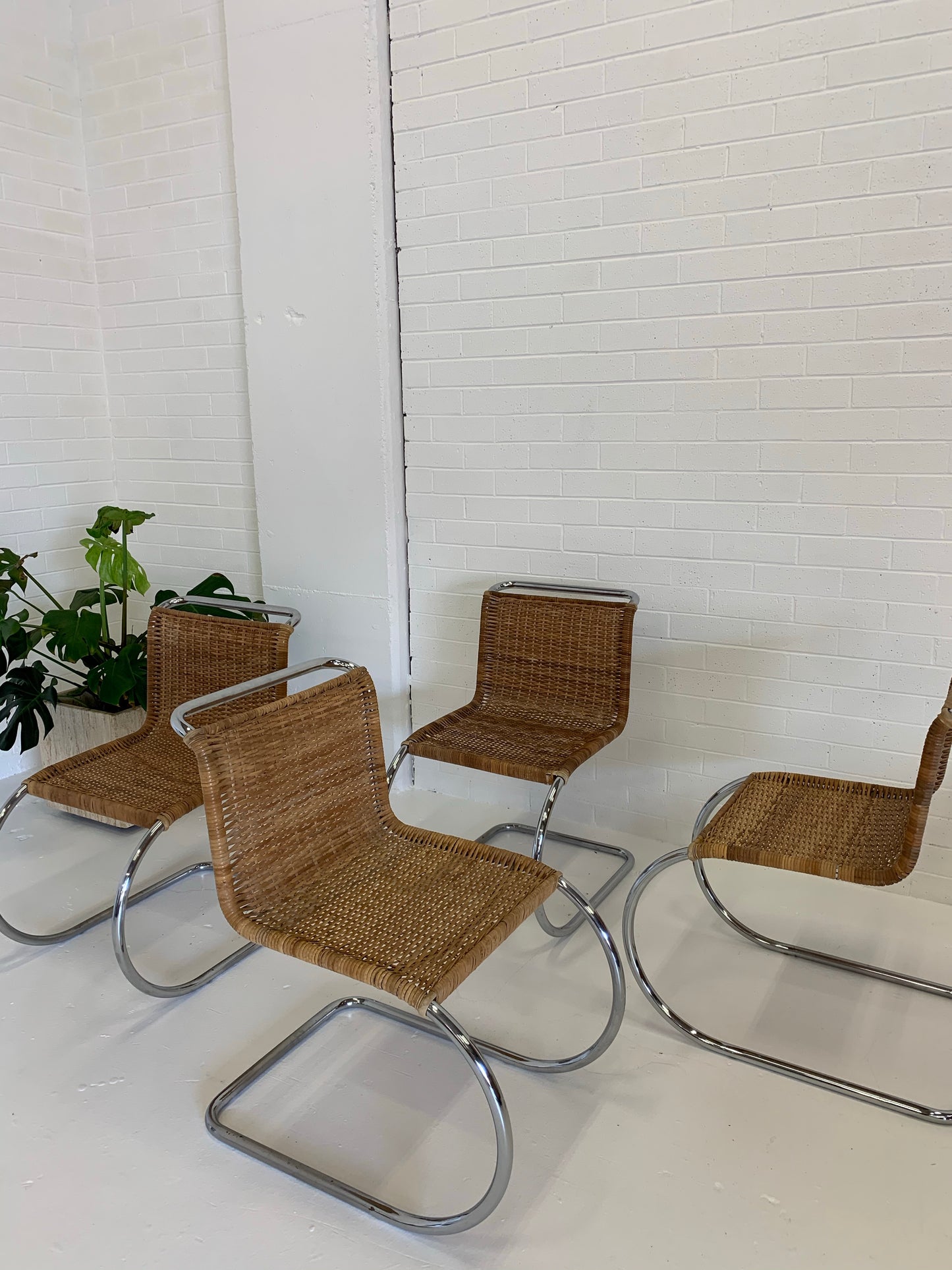 Vintage Cantilever Wicker and Chrome Dining Chairs