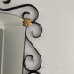 French Curved Iron and Brass Mirror