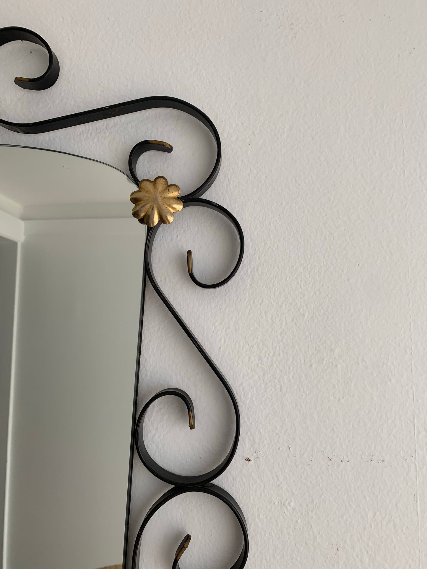 French Curved Iron and Brass Mirror