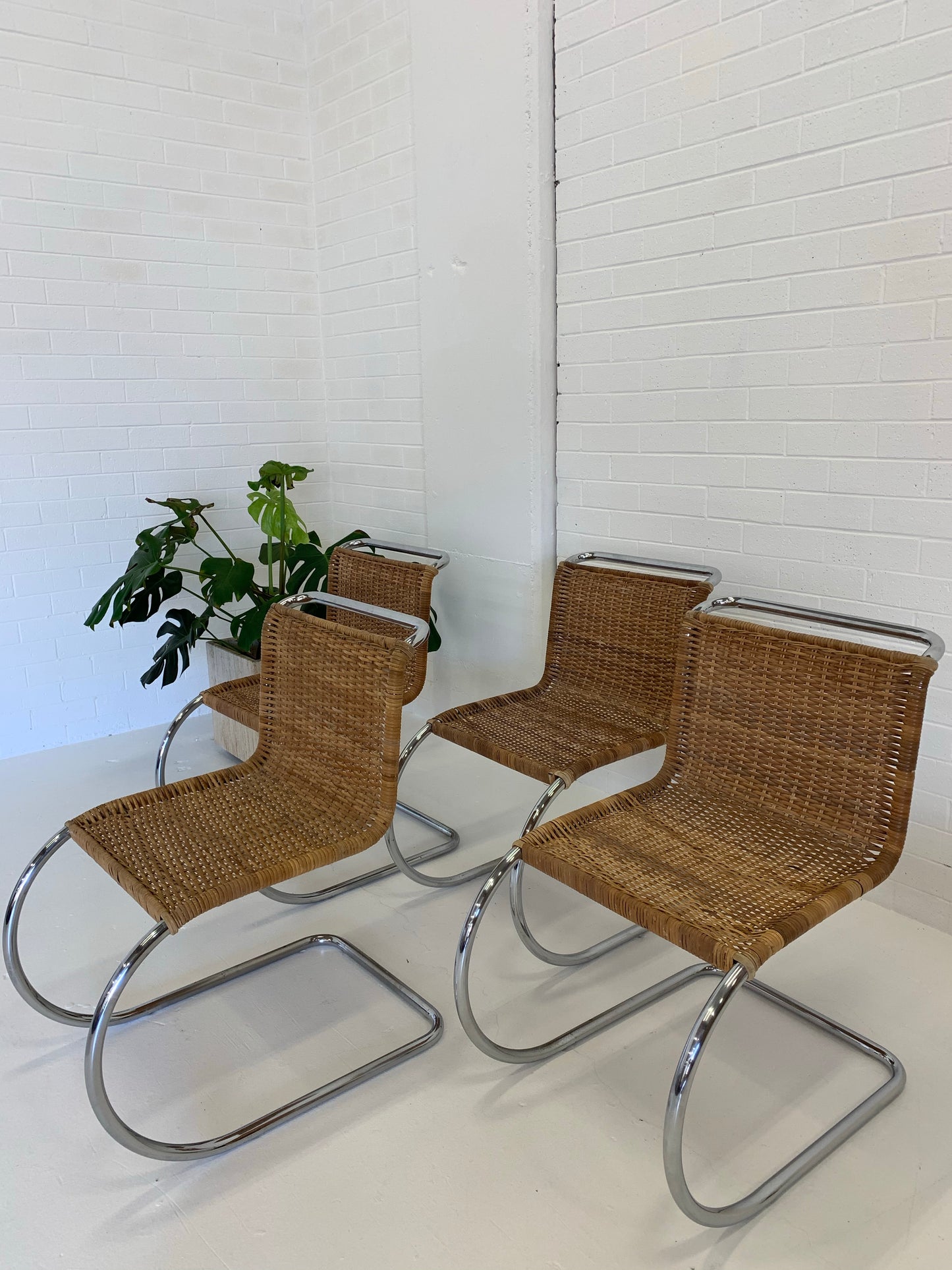 Vintage Cantilever Wicker and Chrome Dining Chairs