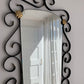 French Curved Iron and Brass Mirror