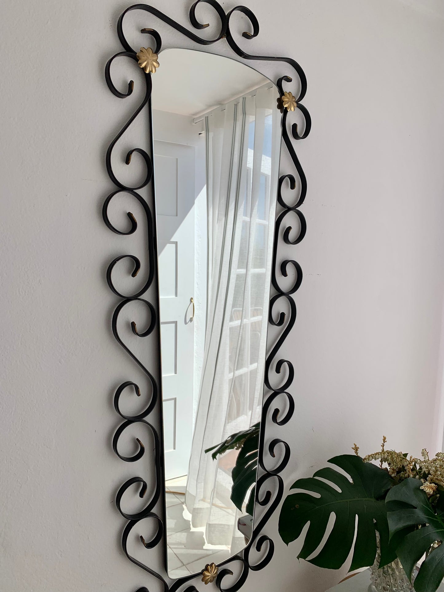 French Curved Iron and Brass Mirror