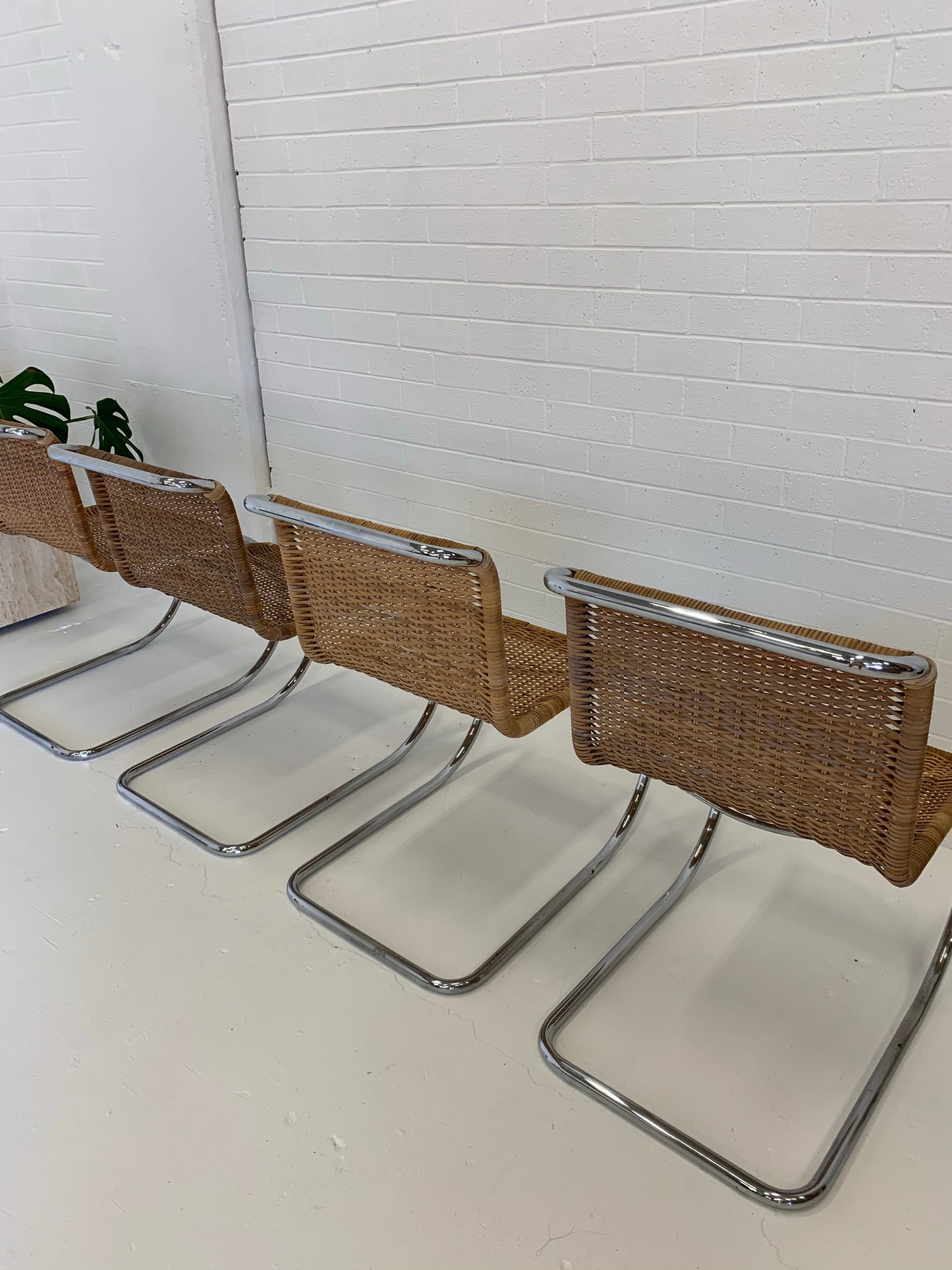 Vintage Cantilever Wicker and Chrome Dining Chairs